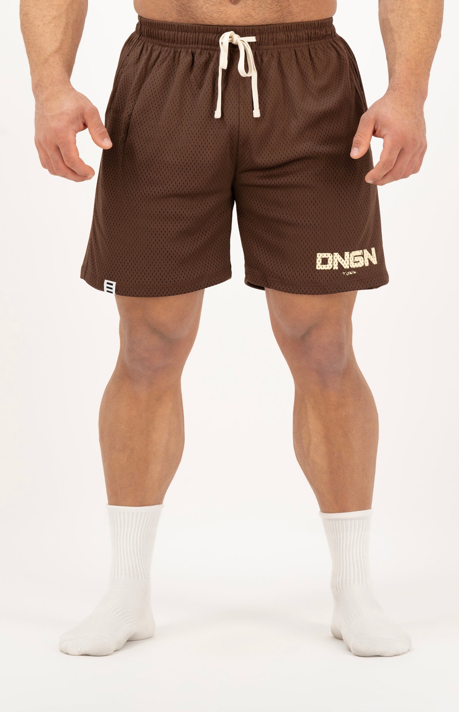 Brown shorts with a logo on a white background