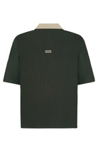 Green shirt with a brand logo on the back against a white background
