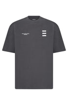Black t-shirt with a logo on the chest against a light gray background